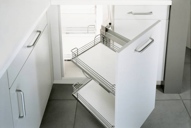 modern kitchen open drawer cabinet and tile floor