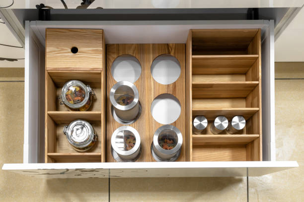 Opened kitchen drawer , a smart solution for kitchen storage and organizing.