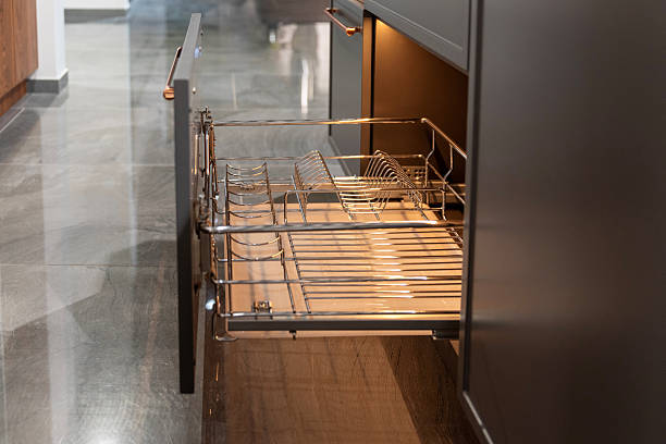 Modern open kitchen pull out cabinet with empty chrome wire basket